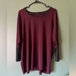 Maroon top with black sleeves